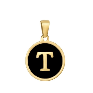 Macro detail of round gold pendant with black enamel inlay and gold letter T engraving