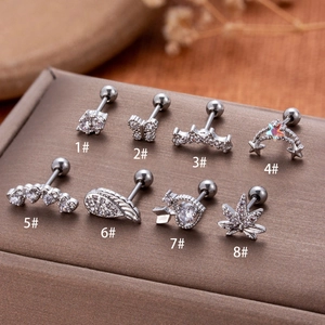 Set of 8 stainless steel stud earrings featuring zircon butterfly, crown and heart shapes