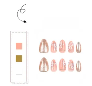 Detail of almond press-on nails featuring hand-painted floral designs and gold glitter