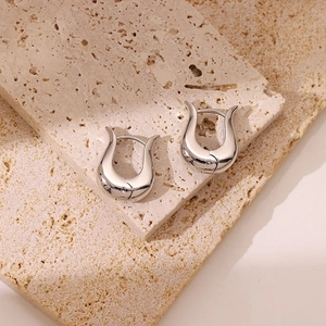Minimalist silver U-shaped stainless steel hoop earrings with a polished mirror finish