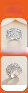 Macro detail of sterling silver lace ring with intricate moissanite pavé setting