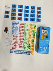 Detailed view of Tetris stacking game set with colorful blocks and CE certified box