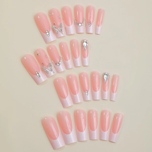 Pink French ombre press-on nails with silver butterflies, pearls and rhinestones decoration