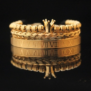 Three-piece gold plated jewelry set with crown charm, Roman numeral cuff and mesh bracelet