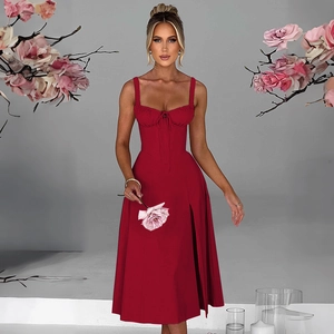 Detail view of burgundy corset midi dress featuring slim fit and side slit design