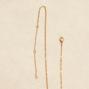 Detail of rose gold stainless steel link chain with lobster clasp and extender