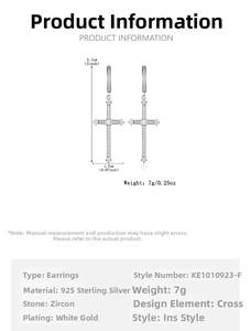 Macro detail of 925 sterling silver cross earrings with zircon pavé and plating