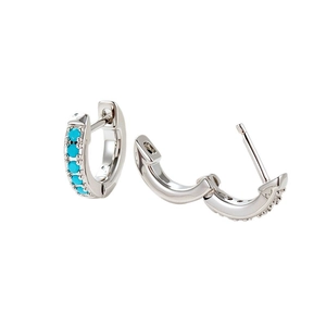 Silver hoop earrings featuring a turquoise stone inlay on a minimalist metal ring