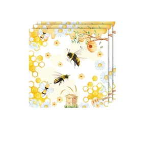 Honey bee party napkins set with watercolor hive and daisy designs for birthdays