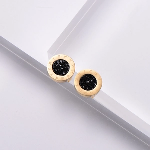 Titanium steel roman numeral earrings with black rhinestones in a gold circular finish