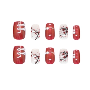 Elegant Chinese style press-on nails featuring red pearls and plum blossom patterns
