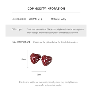 Detailed product size chart showing red heart earrings with white polka dots