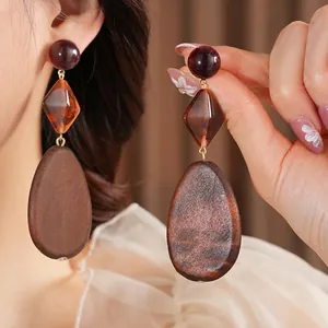 Retro geometric earrings with resin beads and brown wooden teardrop pendants