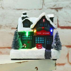 Luminous Christmas toy store miniature with white snow and colorful LED lights decor