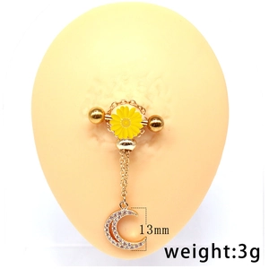 Detail of gold nipple ring with yellow sunflower and crescent moon pendant on model