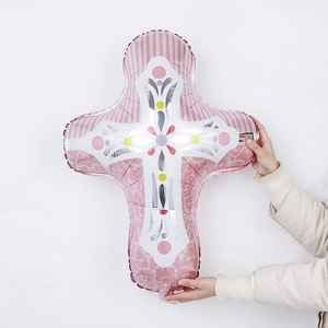 Pink cross-shaped foil balloon with silver floral patterns for baby shower decorations