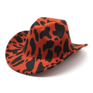 Chapeau de cowboy style western orange vif avec motif vache et bord roulé