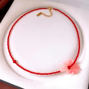 Handmade stainless steel necklace with red stone beads and pink flower pendant necklace