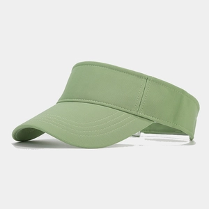 Close-up of light green sun visor with detailed stitching and fabric texture