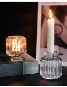 Close-up of ribbed glass candle holder texture with elegant dual-use design for dining