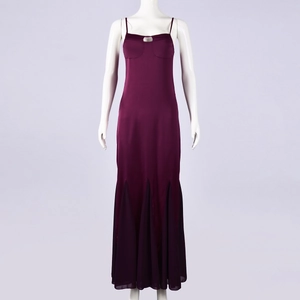 Detail of burgundy satin dress showing the chiffon ruffle拼接 at the fishtail hemline