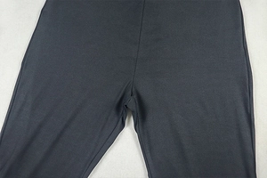 Detail shot of the precise stitching and premium fabric texture on tight jumpsuit