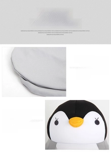 Close-up of penguin plush pillow with high-density elastic fabric and soft 3D details