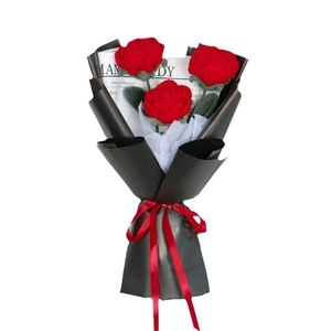 Handmade crochet red rose bouquet in elegant black gift wrapping for Mother's Day