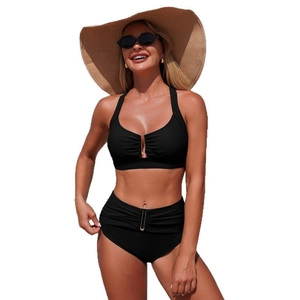 Women's black two-piece bikini with gold U-buckle detail and high-waist ruched bottoms