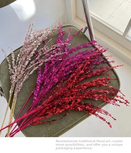 Sparkly sequin firework sticks in champagne gold, rose pink and red for Christmas decor