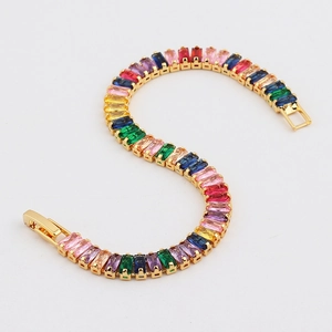 Close-up of rainbow tennis bracelet with multi-color rectangular cubic zirconia stones