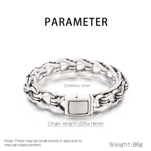 Macro detail of men's vintage stainless steel chain bracelet with a square clasp