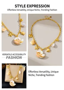 Detailed view of gold ocean charms including conch shell, starfish and turtle pendant