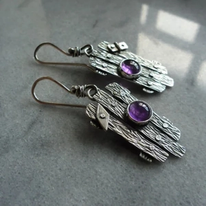 Vintage silver metal geometric earrings with engraved texture and round purple gemstone