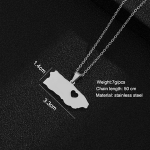 Detail view of silver Puerto Rico map pendant necklace with heart cutout and dimensions