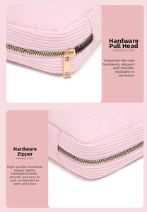 Detail of pink corduroy fabric and smooth gold metal zipper on portable cosmetic bag