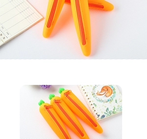 Detail of creative carrot silicone pencil case showing zipper and study scene