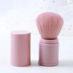 Portable pink retractable makeup brush with lid and dense soft bristles for powder and blush