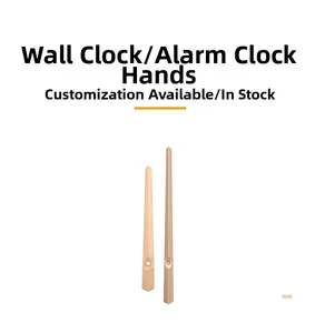Detailed view of minimalist rose gold aluminum clock hands with smooth metallic finish