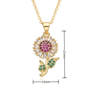 Detail shot of sunflower pendant with zircon petals and 21mm by 12mm dimensions