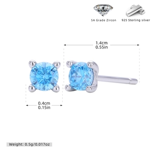 Detailed macro view of 925 silver stud earrings with 4mm light blue zircon in claw setting