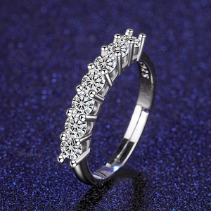 Detailed macro view of S925 sterling silver half eternity ring with seven cubic zirconia