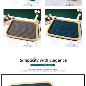 Detailed view of bamboo velvet ring display trays in charcoal and navy blue colors