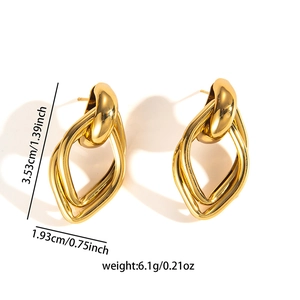 Macro shot showing dimensions of gold irregular double-hoop stainless steel earrings