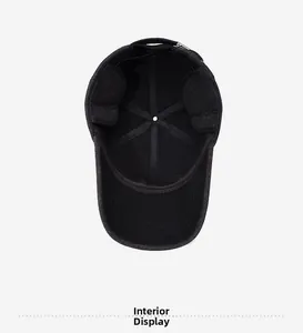 Detail view of the warm interior lining and ear flaps of the black winter baseball cap