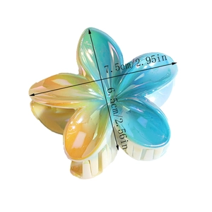 Iridescent lily flower hair claw clip with laser gradient effect and dimensions 7.5x6.5cm