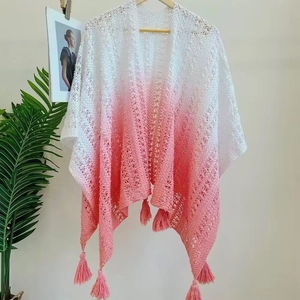 Boho knit shawl with gradient white to pink hue, hollow out design and fringe details
