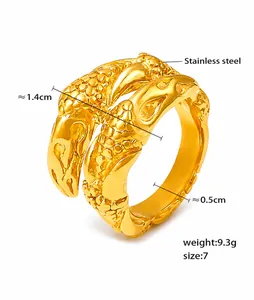 Macro detail of 18k gold plated stainless steel ring with hammered scale texture details