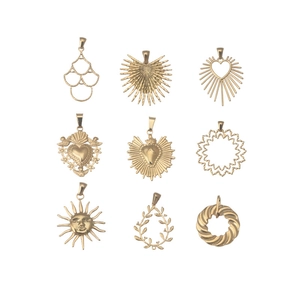 Golden stainless steel sun and heart charms collection in various artistic designs