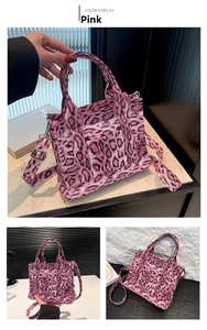 Detailed view of pink leopard print tote bag with adjustable strap and front pocket